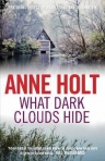 WHAT DARK CLOUDS HIDE