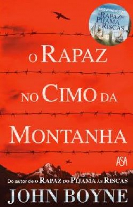 RAPAZ NO CIMO DA MONTANHA